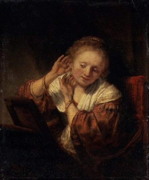 Junge Frau probiert Ohrringe an – Rembrandt van Rijn Rembrandt van Rijn 2024-11-21